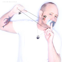 a man with a tape on his mouth