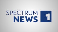 spectrum news logo on a gray background