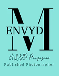 the logo for envydd, a published photographer